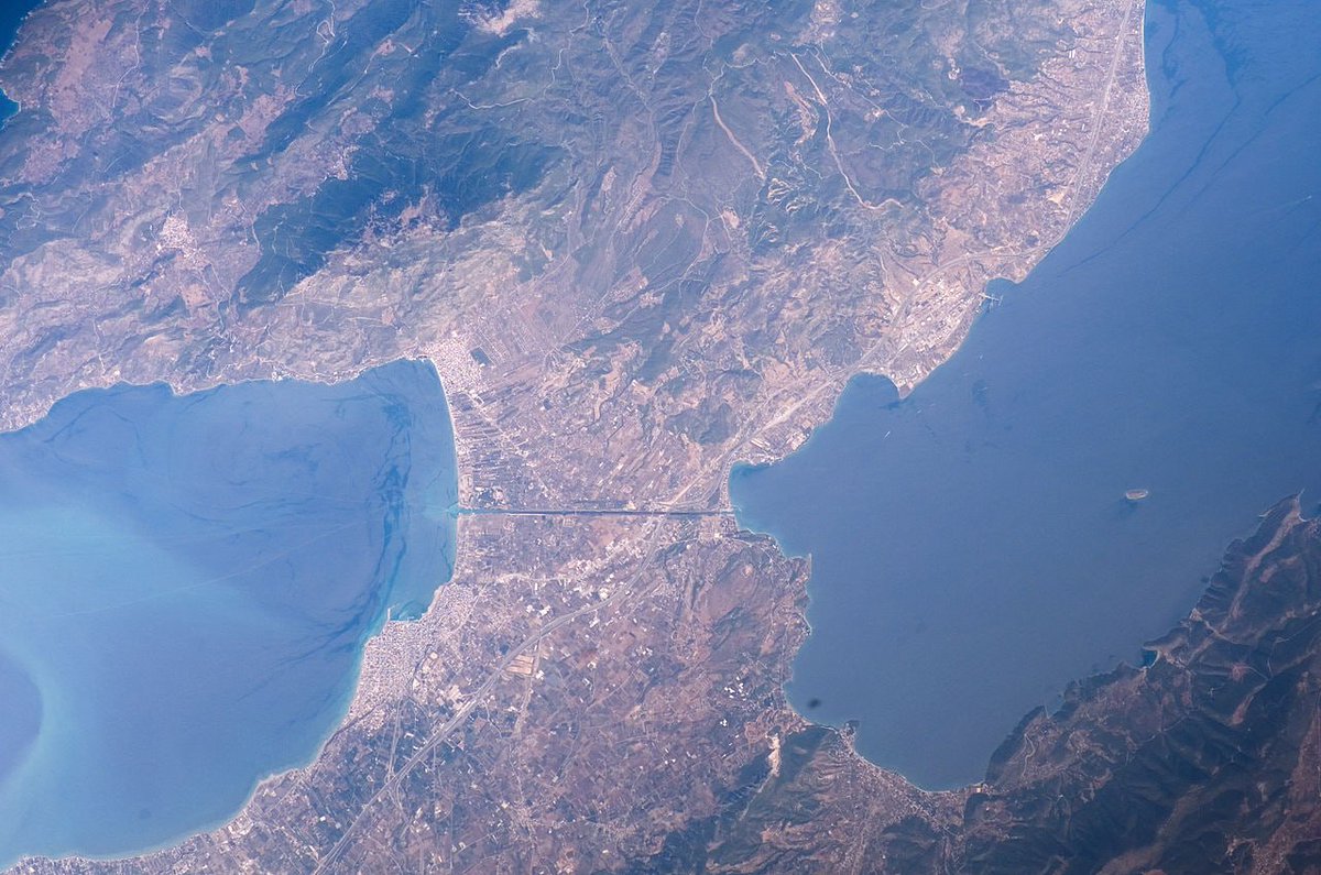 EquatorAI's tweet photo. The Incredible "Iron" Road of Antiquity – The Diolkos

In the 6th century BC, the Greeks shortened the route between the Ionian and Aegean Seas from 400 km to just 6–8.5 km by constructing a stone-paved road across the Corinth Isthmus, used to transport goods and entire ships.

The crossing took only 3–4 hours! This inspired the ancient Greek saying "as fast as a Corinthian" (Aristophanes). Not only merchant ships but also entire naval fleets used the Diolkos. After his victory at Actium, Octavian Augustus ordered 260 warships to be hauled across.

Today, 1,100 meters of the road have been excavated. It was stone-paved with carved tracks, preventing heavy ships from slipping on inclines or curves. Interestingly, its track width—160 cm—is nearly identical to modern railway gauges!

Who pulled the ships? Teams of up to 200 men and oxen—ancient Greek "boat haulers."

Surprisingly, the history of railway transport began here—on the Diolkos, 2,500 years ago!

#Archaeology #History #AncientGreece