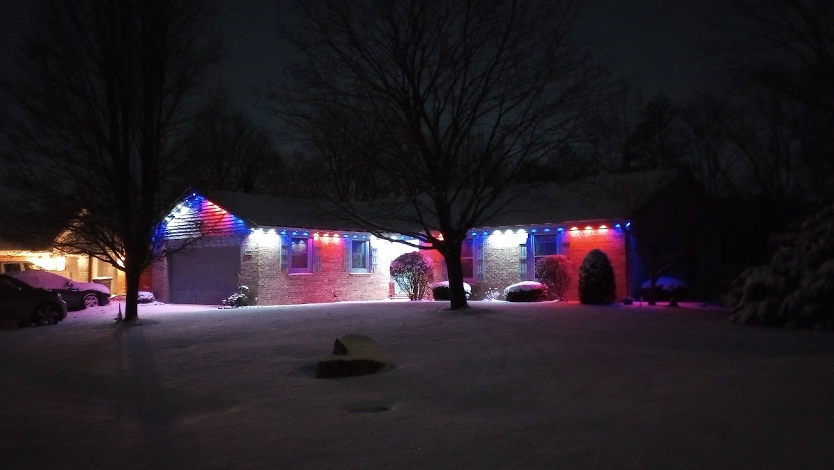 Found a house with very cool lights under the roof edge. They change the colors with the seasons. Today is Presidents' Day, so they are appropriately red, white, and blue today!