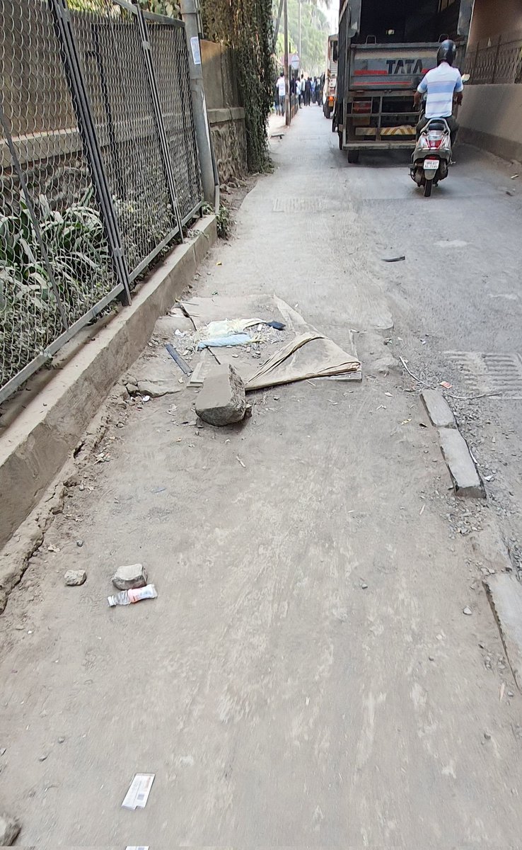 Supersmart999's tweet image. @mybmcWardPS your ward is clearly not concerned about safety of pedestrians. 
The footpath has too many drain covers,most of them are broken/poor quality and the footpath is without tiles/paverblocks.
Ps ward is the worst in terms of cleanliness and basic infra.