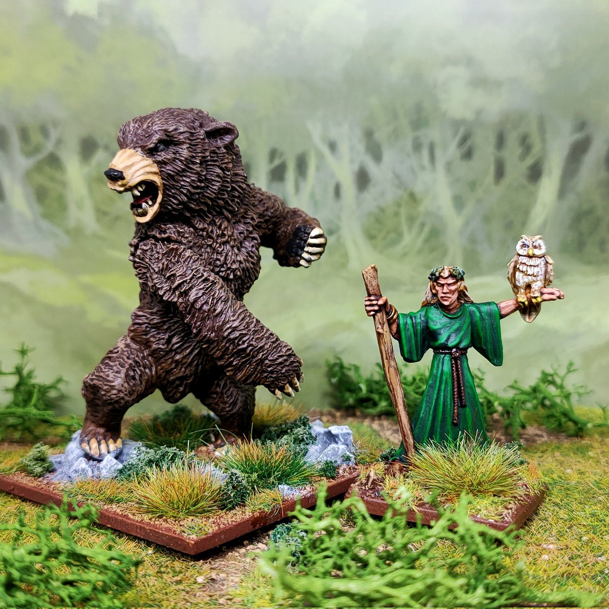 Elf druid with bear.

A couple of figures I painted years ago given a few touch ups to add them to my Wood Elf army.