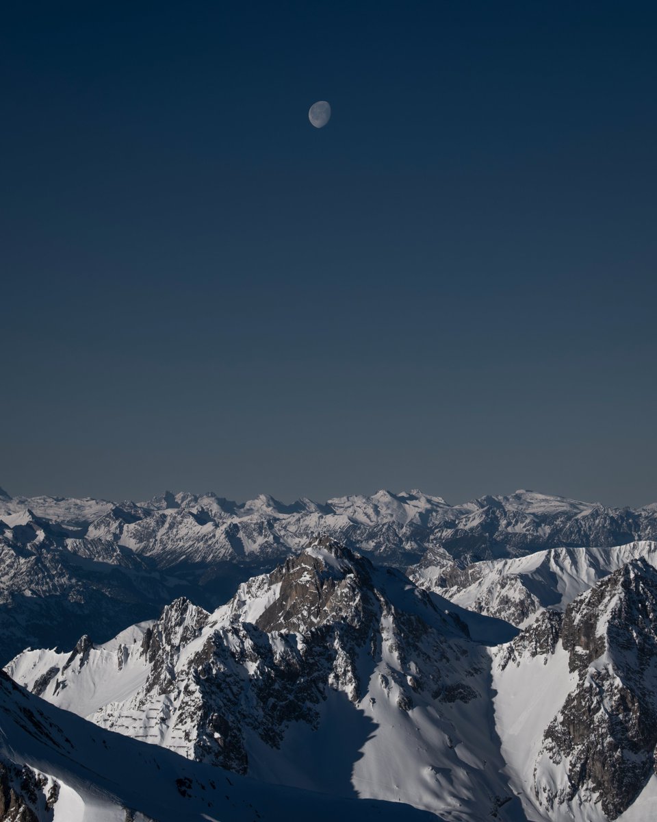 Silver moon in the Arlberg Alps