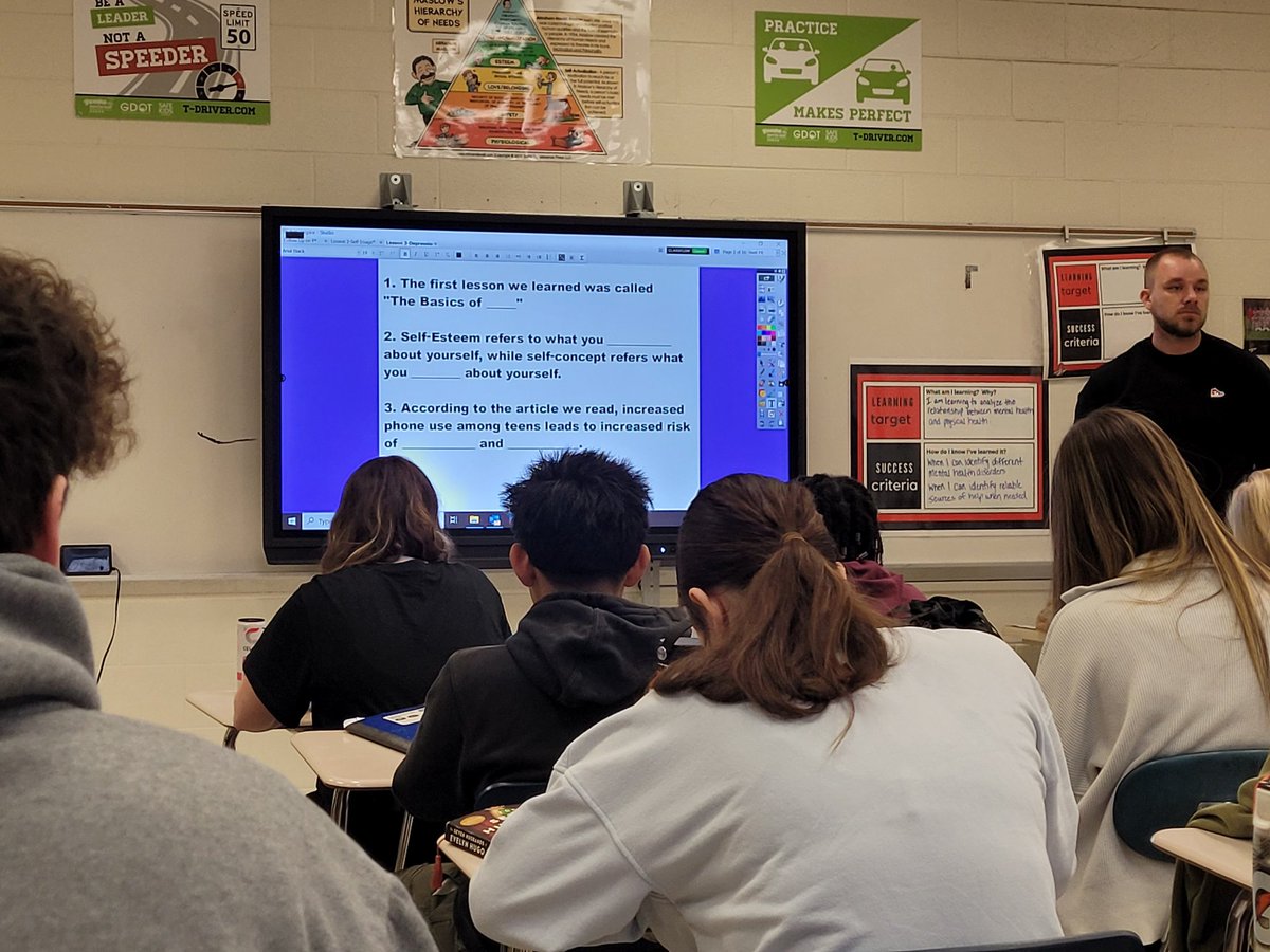 Coach Veihman challenges students to think &amp; write about 2 different sets of questions in Health - ones that are open ended/general vs. others with added context. This blends seamlessly into a conversation about metacognitive awareness and how we best retain information.