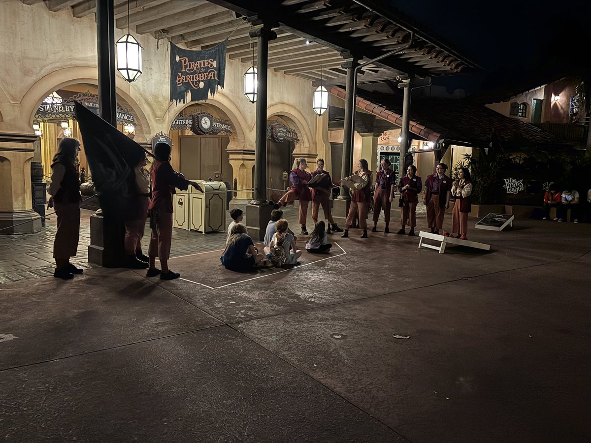 Sitting here at Magic Kingdom and Pirates is down, so they have about five kids sitting outside the ride in a row or two with the cast members reenacting the entire ride