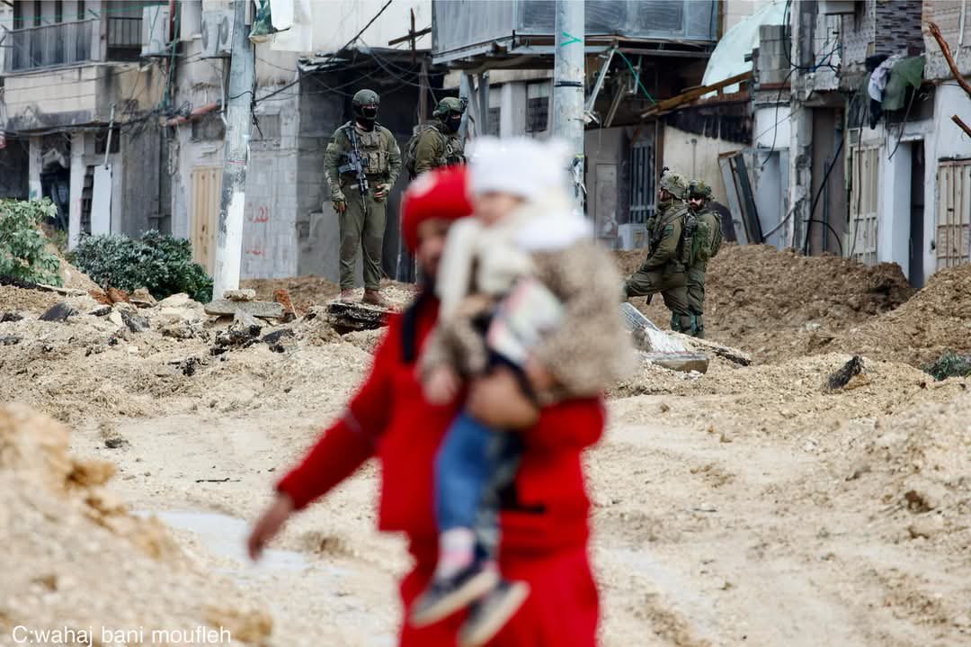 PalestineRCS's tweet image. The heroes of the Palestine Red Crescent are assisting patients, the elderly, and children in Noor Shams Camp, #Tulkarm, as they evacuate after the occupation forced dozens of families to flee. Meanwhile, the occupation continues its raid on the camp, destroying streets and