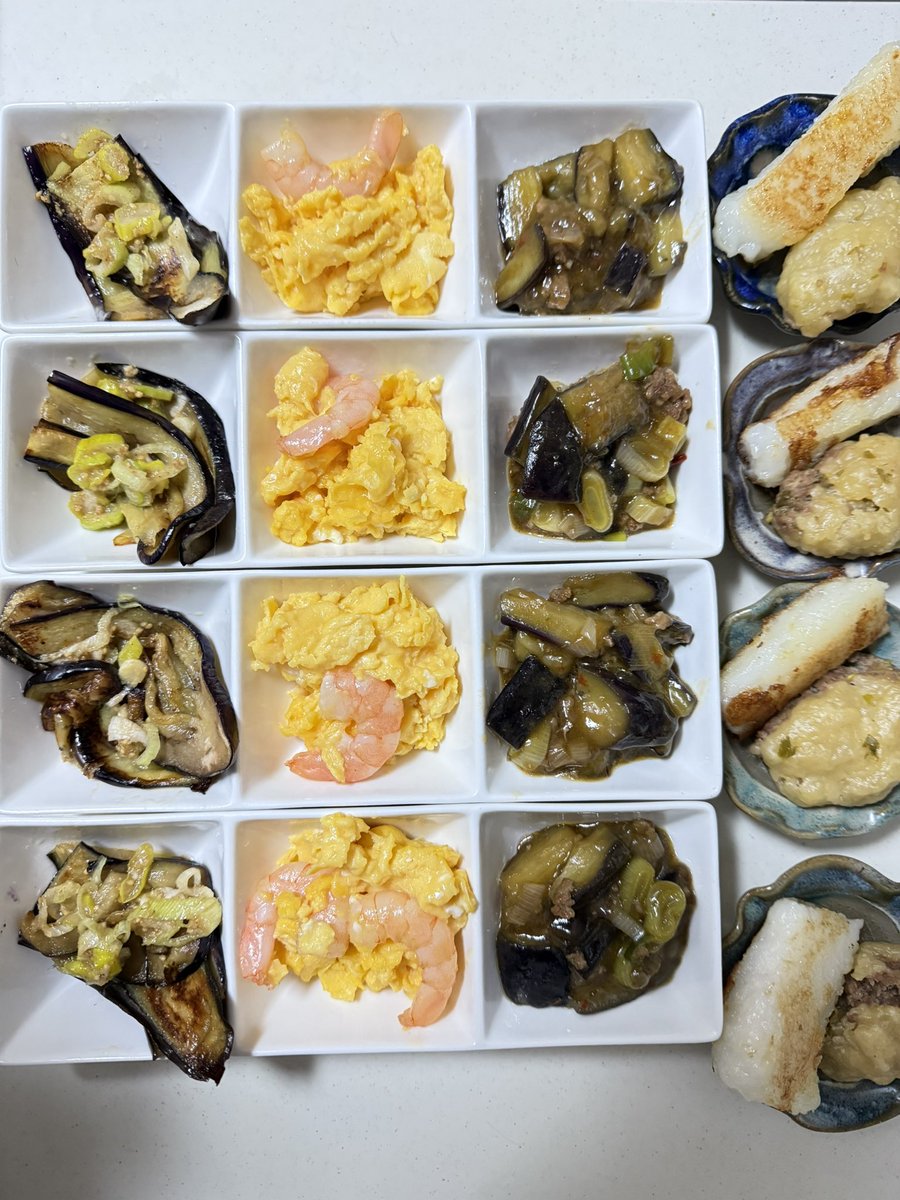 tomoyako's tweet photo. 飛行機の遅延で中華を食べ損ねたので、自分で作ってみました😅
「マーボ茄子」「焼きナスの香味掛け」「卵とエビの中華炒め」「大根餅」「ミニミニマントウ」  # 作り置き  #おうちごはん https://t.co/gUGCDu2olQ