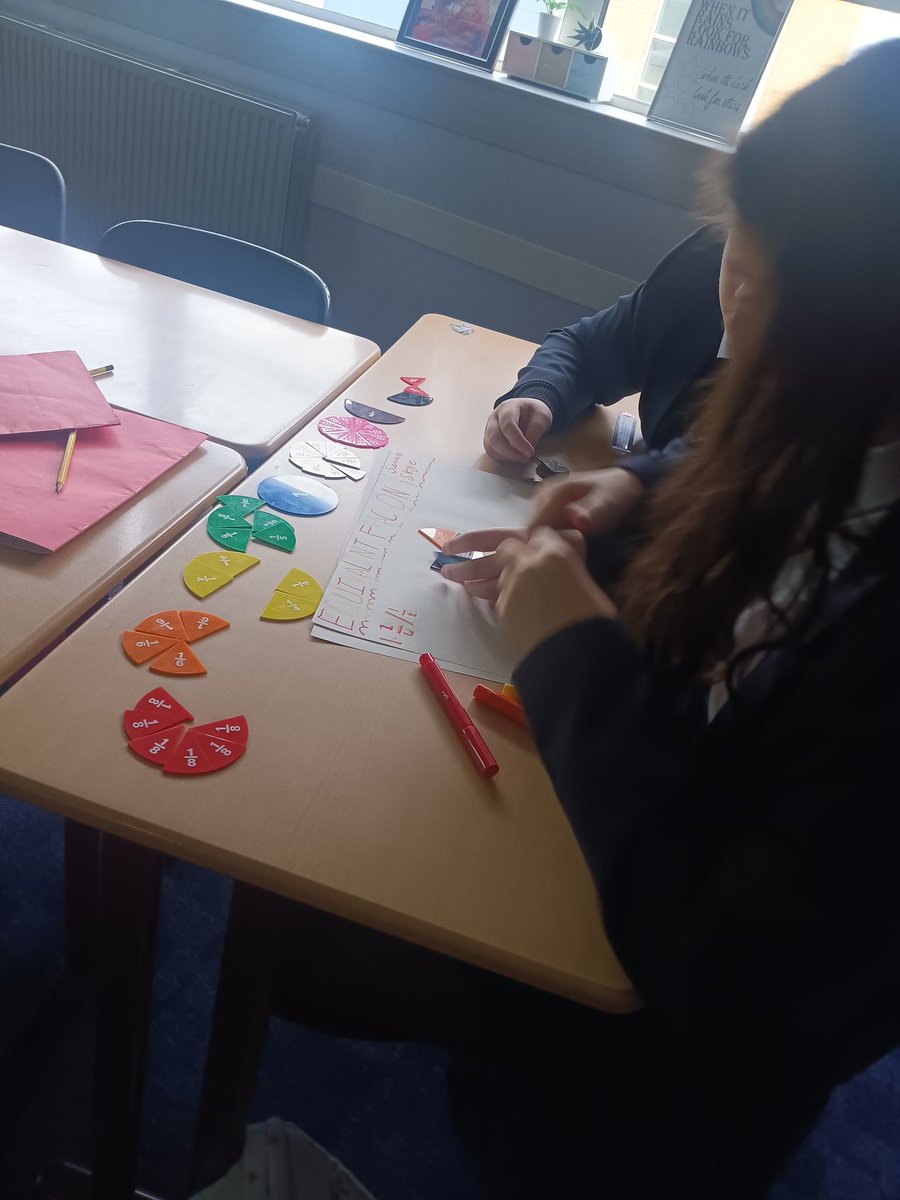 We have also been exploring fractions in S1! We can identify, add, subtract and find fractions of amounts! Here we are using our concrete materials to experiment with equivalent fractions!