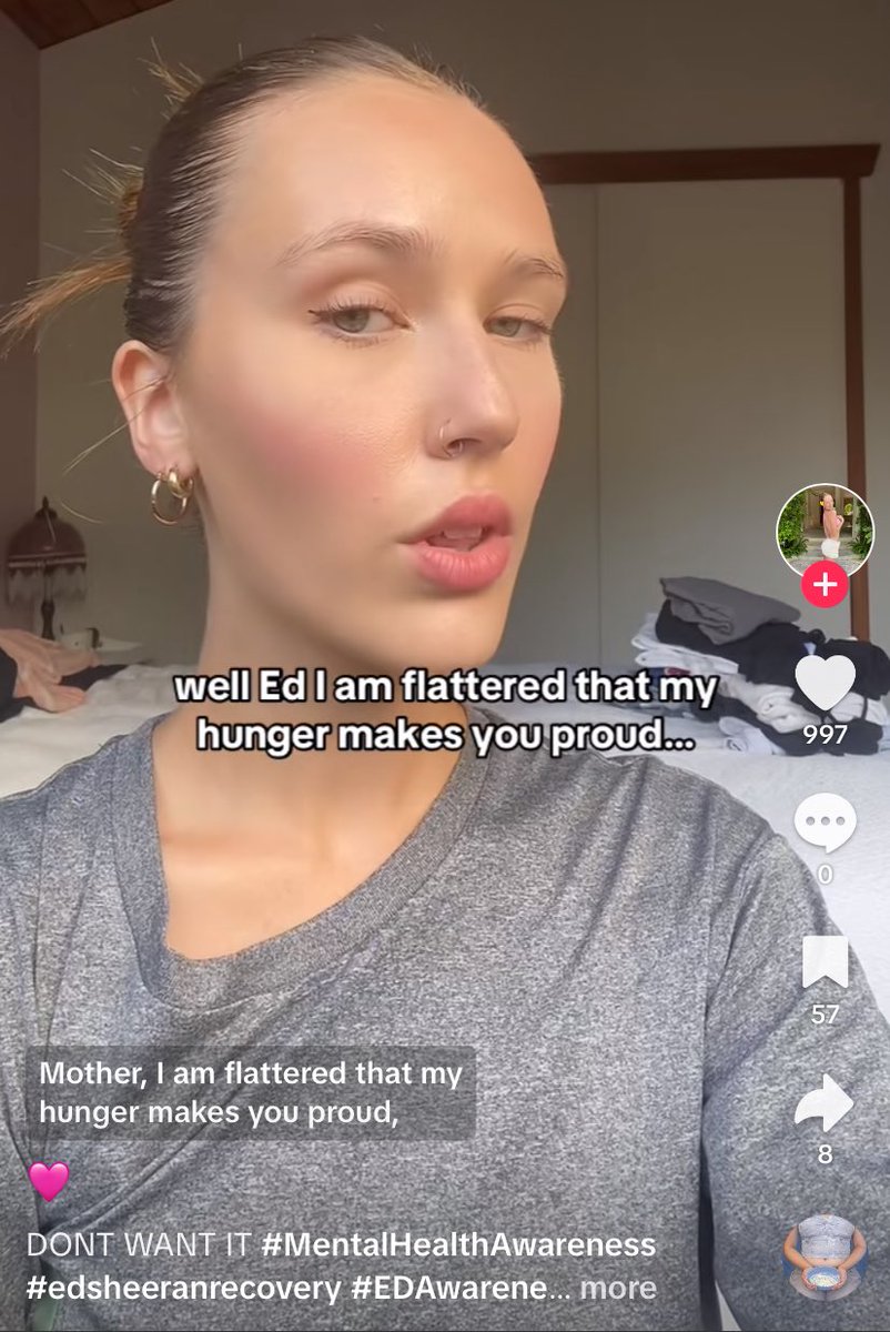 the shirt tucked into her armpit to make sure the collarbone is showing 😭