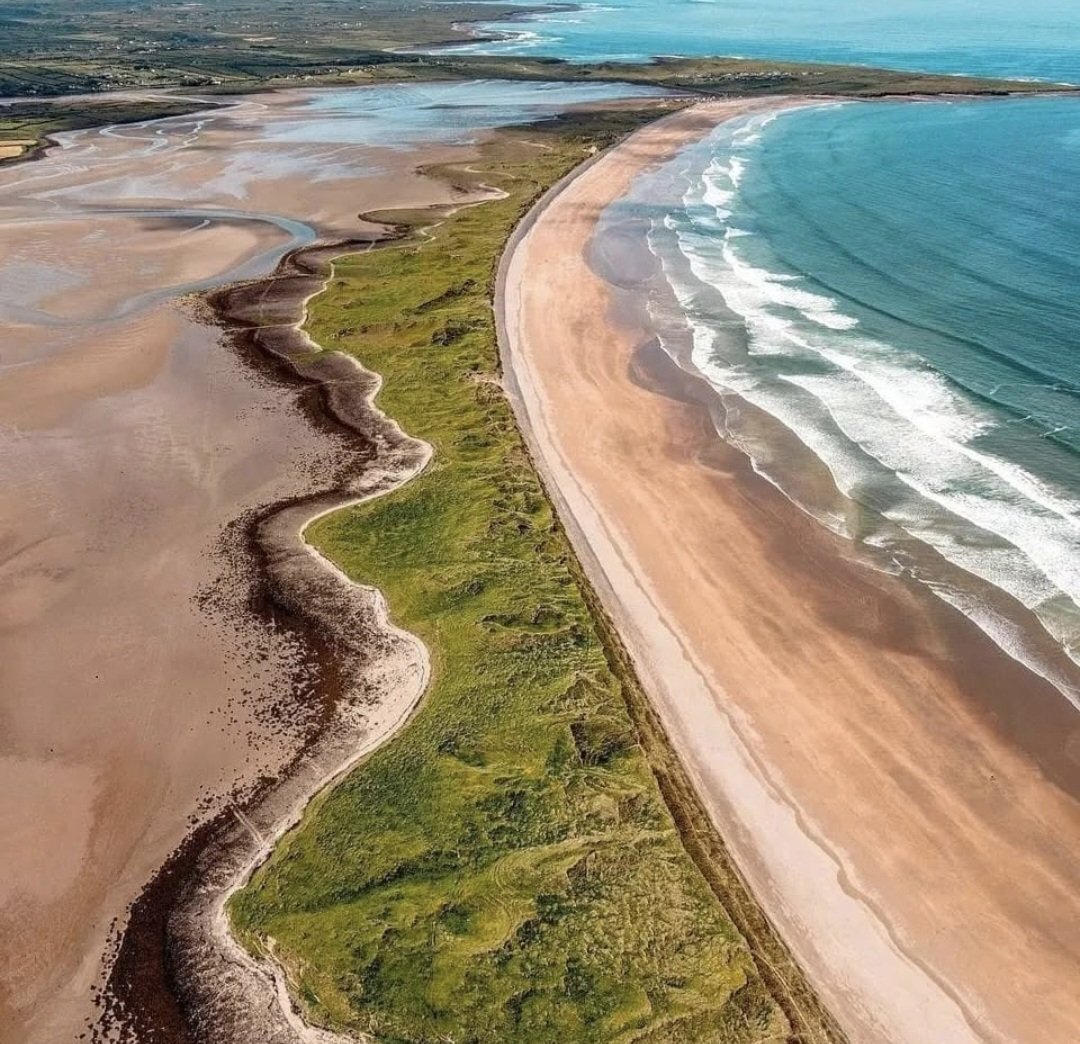 Streedagh Beach is a stunning, sandy beach located on the northwestern coast of County Sligo, Ireland. It is famous for its breathtaking views of the Atlantic Ocean, its unspoiled natural beauty, and its historical significance. The beach is part of the Wild Atlantic Way and is