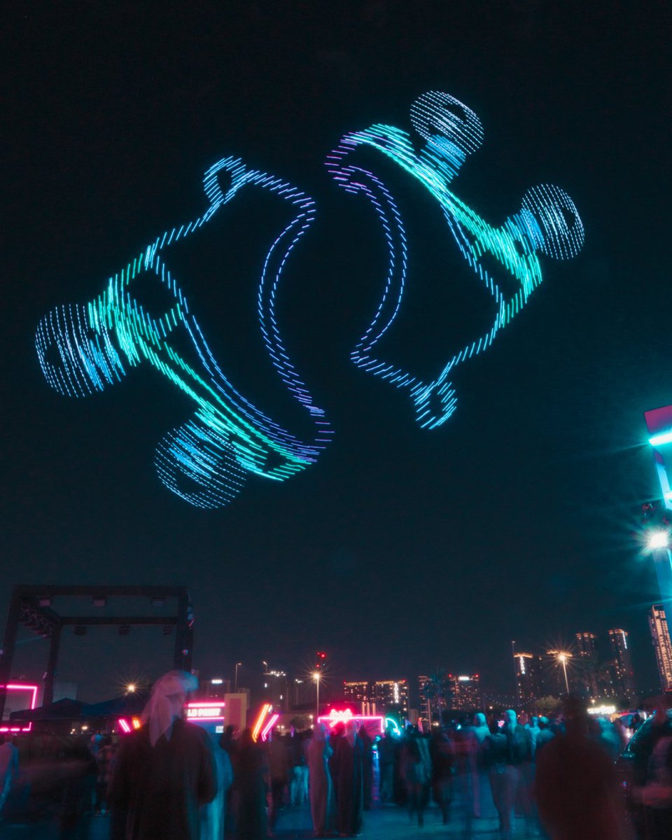 cyberdroneshow's tweet image. #Nostalgia has a way of sneaking up on us—a sound, a scent, a glimpse of something familiar. At #MOTB, we took that feeling and painted it in the sky.

#dubaishoppingfestival #retro #synthwave #retrowave #cyberdrone #drones #cyberdroneshow #droneshow #uav #droneart #festival