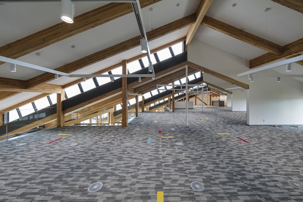 Haruna Beverage's Innovation Center is designed as a dynamic hub for product development, fostering creativity through open, nature-inspired spaces with a fireproof wooden structure and seamless public-private integration. #SustainableDesign #Innovation ow.ly/sjSF50UYkMr