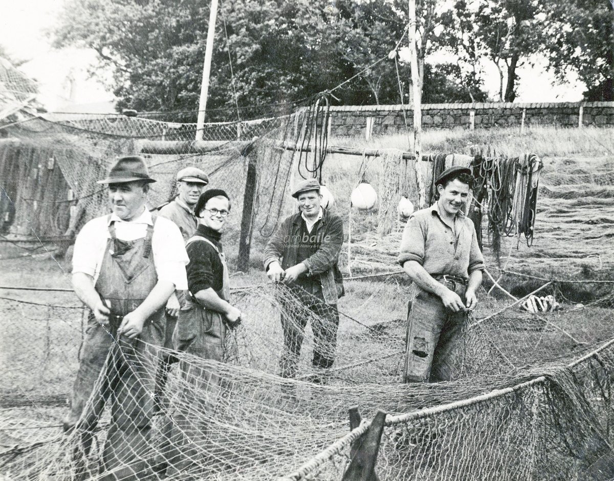 Mending nets at the salmon fishing station at Bayfield, #Portree, circa late-1940s/early-1950s.

L-R: Neil Angus Nicolson, (Foreman - Net Man); Sandy (the Hearach) MacLeod; David Banks (son of the lease owner James Banks); Peter (Grey Hen) Whiteford; and Calum Matheson

[David
