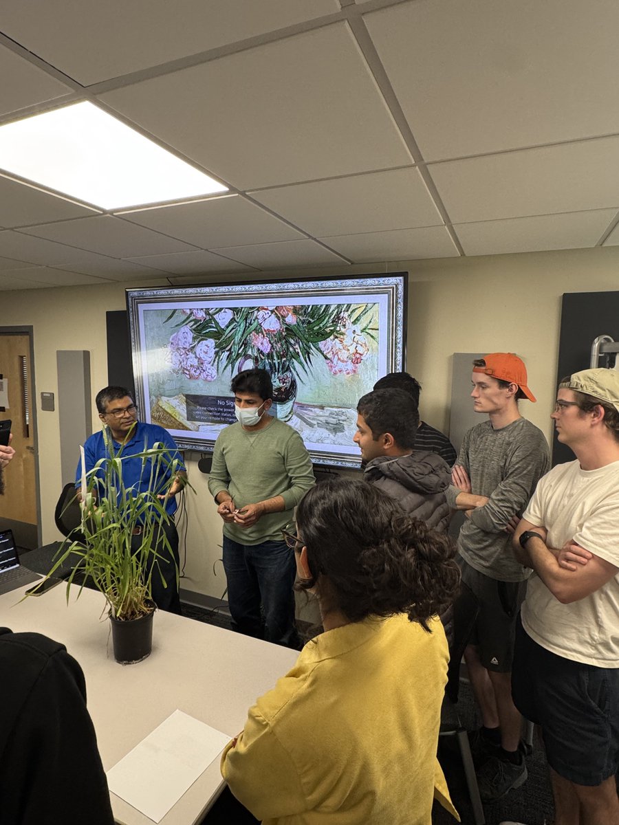 Dr. Babar demonstrating key breeding concepts with a wheat plant in class. 

Nothing beats learning by doing.