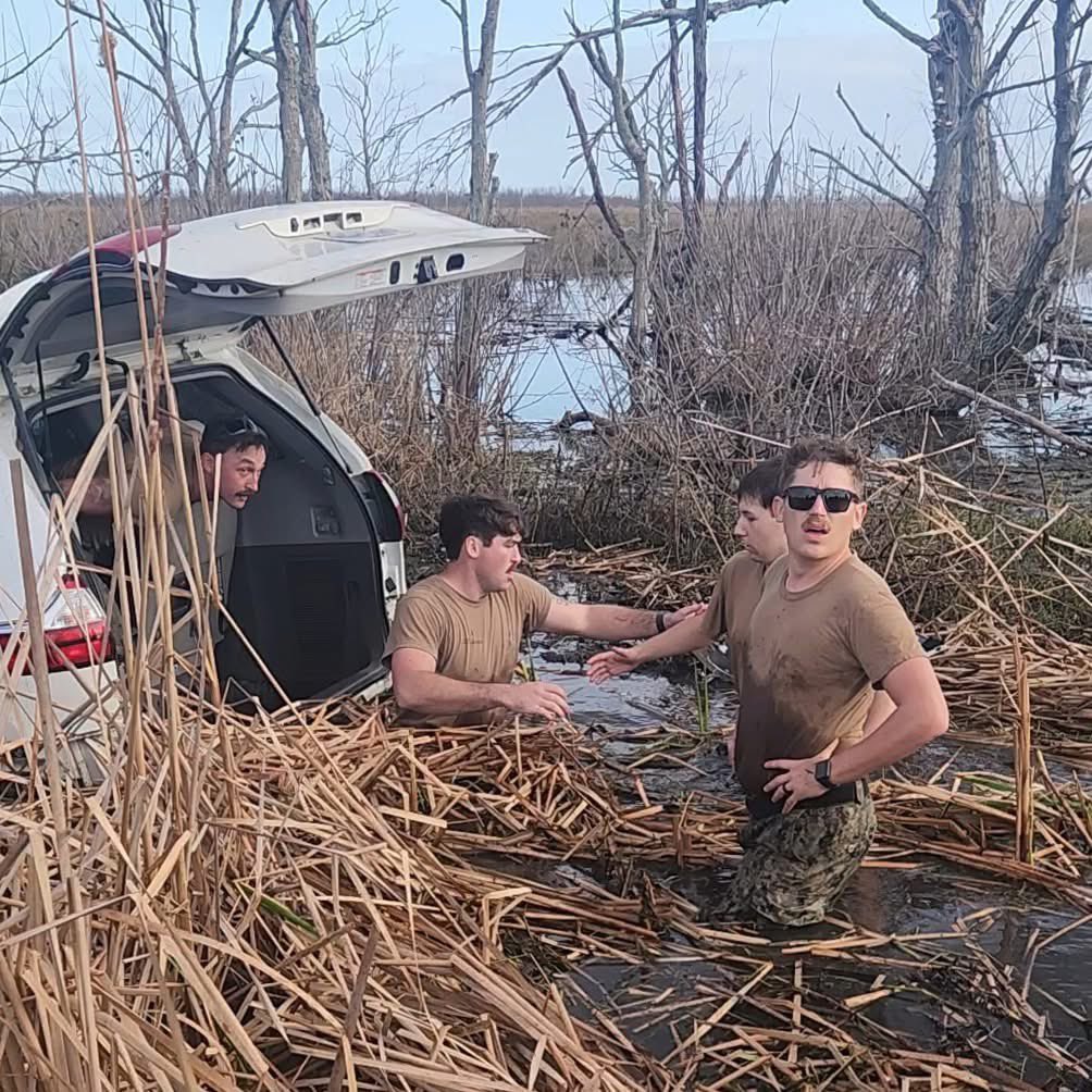 SEABEES - ALWAYS READY TO HELP!

Last week, a convoy full of Seabees were returning from an exercise in Louisiana when they observed a car accident and submerged vehicle off of I-10 outside New Orleans. Upon seeing two elderly motorists stranded inside, they dove straight into