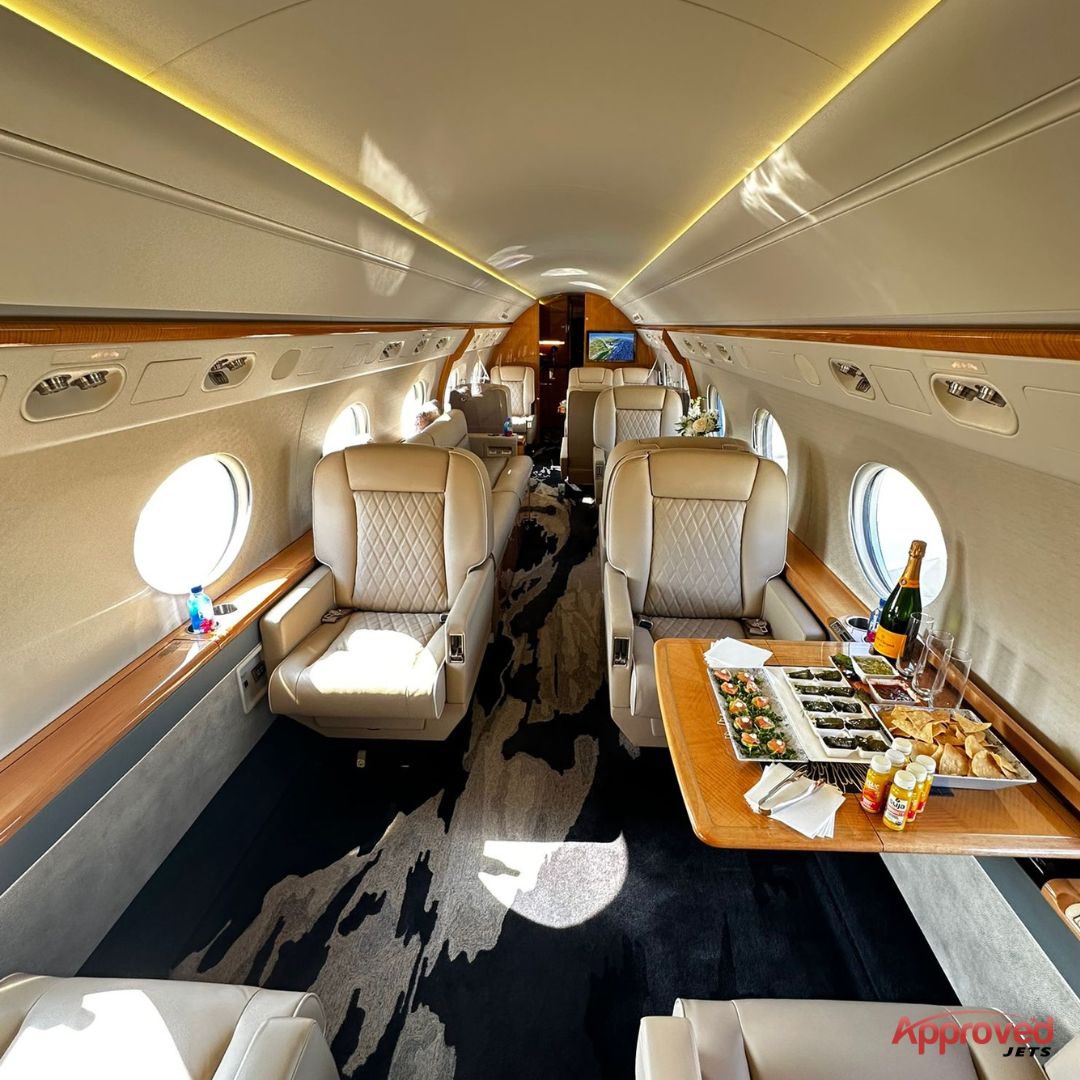 Leather seats, gourmet treats, and skies without limits. 🥂✈️ Fly in comfort and style with Approved Jets. #LuxuryJet #FineDiningAboveTheClouds