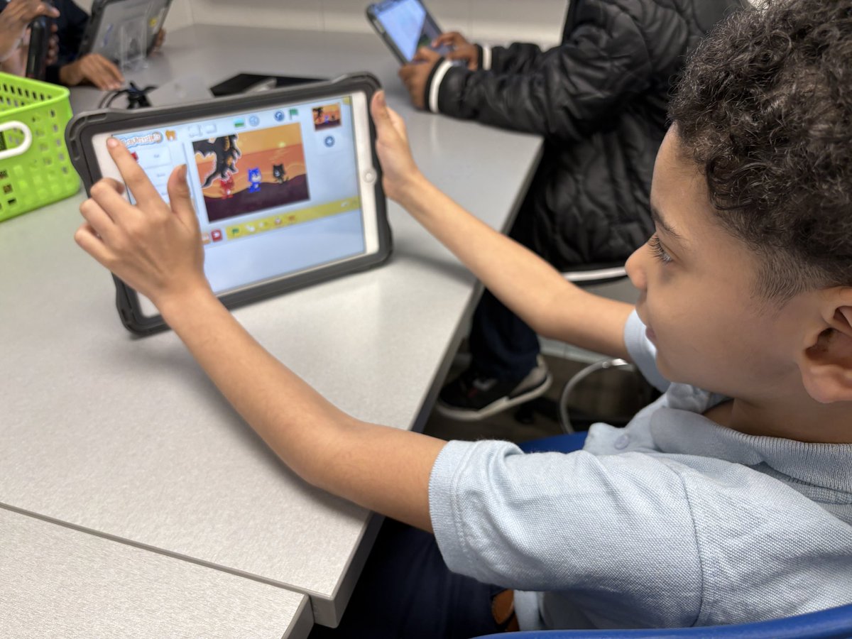 These 2nd graders really enjoyed writing lines of code using the Scratch Jr. app!