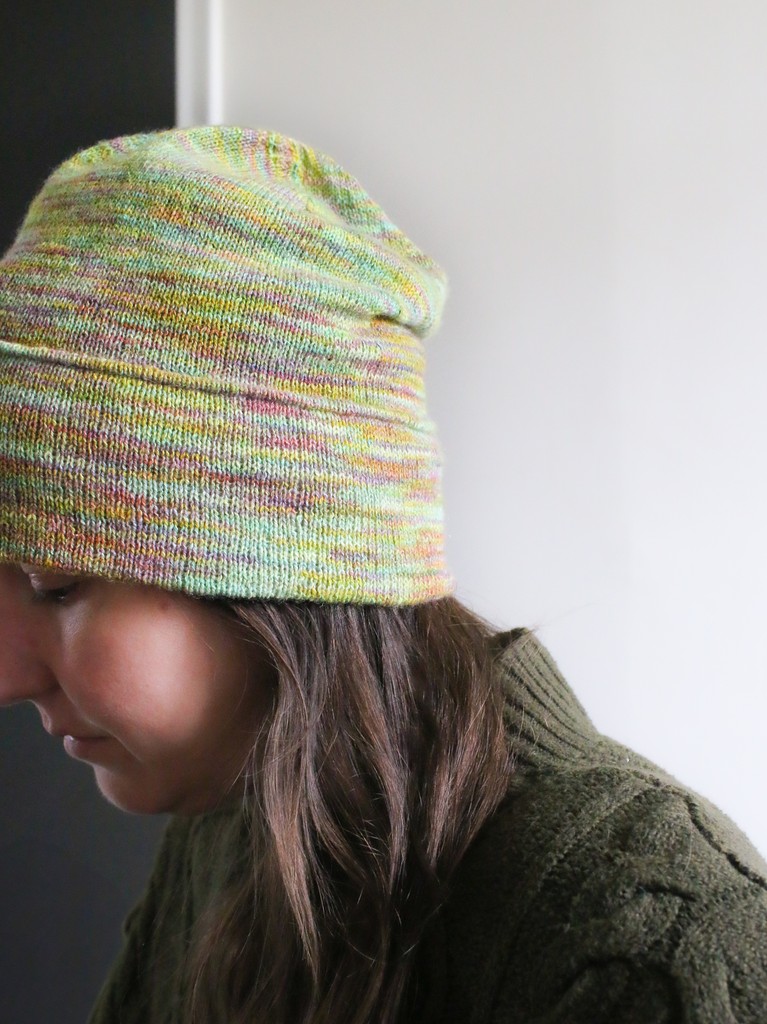 Take Churchmouse Yarns &amp; Teas’ Thinking Cap w/ the perfect slouch. Add silky, Merino-y, cashmere-y Tosh Pebble. Mmmmmmmm. (Pictured in Fire Opal).
⁠
madelinetosh.com/products/think…