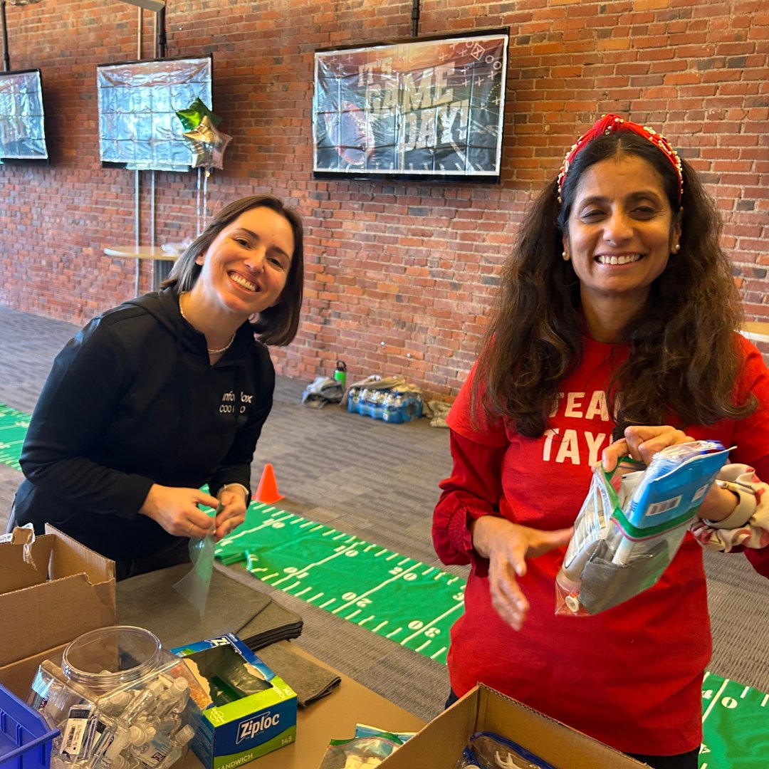 Infoblox's tweet image. At #Infoblox, we like to turn friendly competition into heartfelt missions! Yesterday, three teams tackled a football themed “Build-A-Bag” challenge in our Tacoma office. Our collective efforts scored 300 Warm Weather Kits to support our unhoused neighbors.  💚
#InfobloxLife