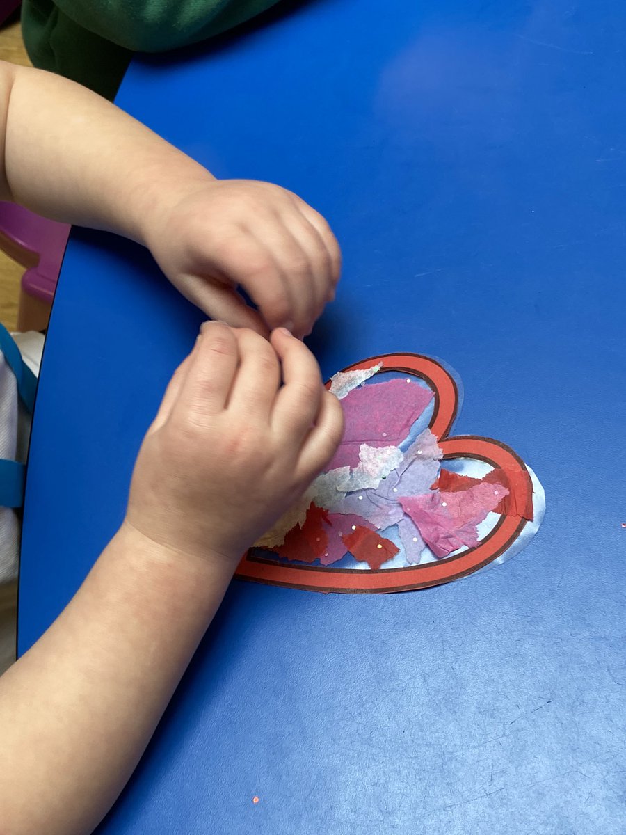 Independently creating heart shaped, stained glass effect decorations. <a href="/StMarysCIW/">St Mary's Church in Wales Primary School, Brynmawr</a>