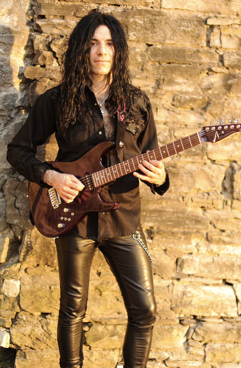 MikeCampese's tweet image. A shot from the photo session from the “Chameleon.” Album.  It was taken outside later in the day and sun just happened to be shining bright.  

Check out the “Chameleon” album if you have not.  It is a fav among the MC fans!  #mikecampese #photosession #sun #chameleon #guitarist
