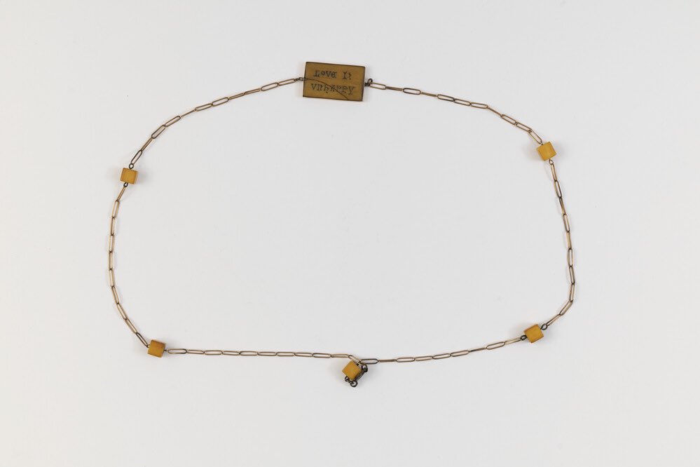UniRdg_SpecColl's tweet photo. For #EYALove, here’s a necklace that James Joyce designed and gifted to Nora Joyce for their fifth anniversary. The inscription is from Joyce’s poem ‘Chamber Music’ and reads ‘Love is unhappy when love is away’.
[SSJ-OBJ/004]
#jamesjoyce #chambermusic #love #exploreyourarchive https://t.co/PiwGO3eMMa