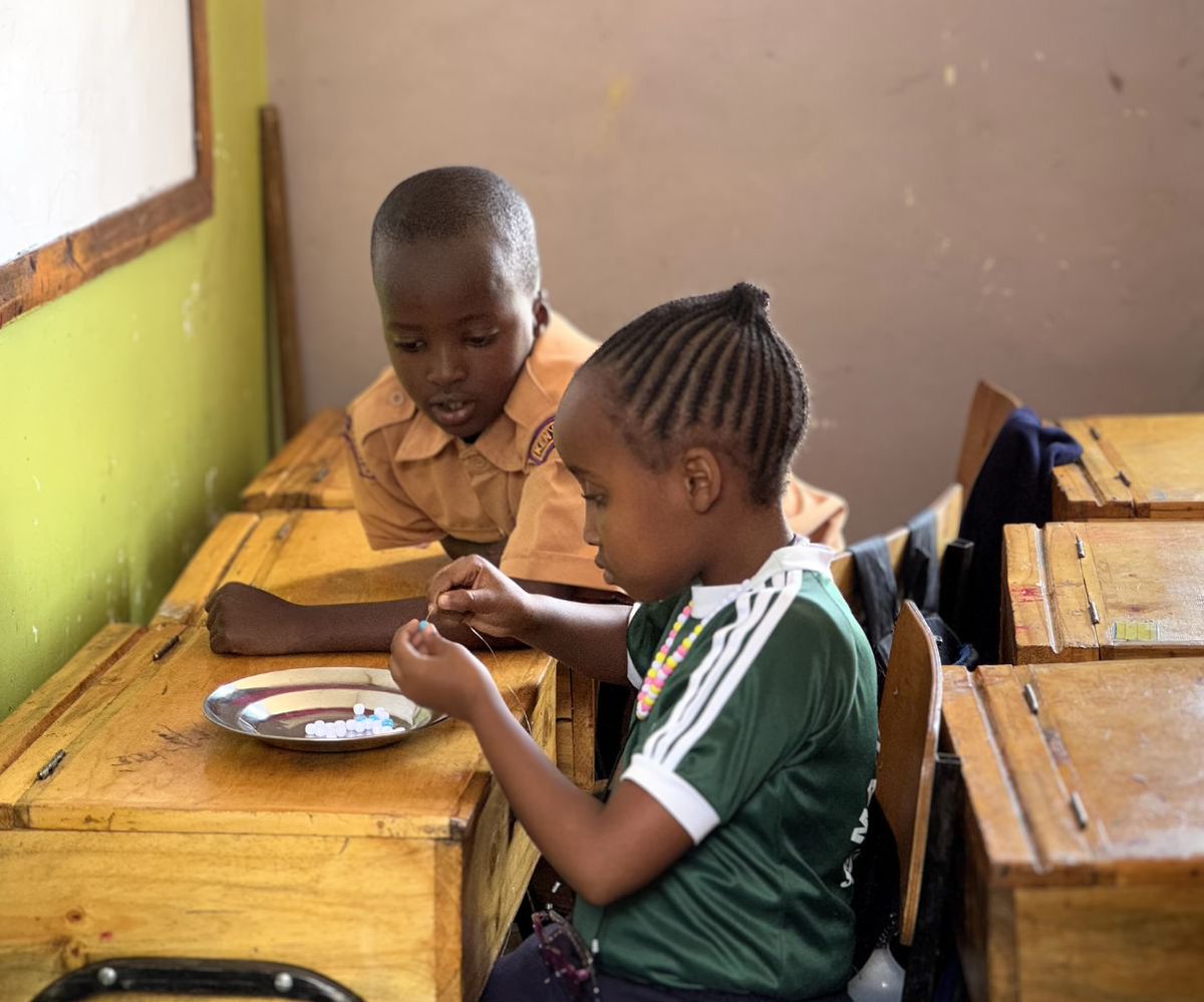 edukenya's tweet photo. Who wants a friendship bracelet?! Beadwork is an art form in Kenya and dates back centuries. A bead's color can communicate your age, marital status, or significant life events. Our students put their skills to the test and developed creativity, teamwork, and attention to detail! https://t.co/fhfGybb9I5