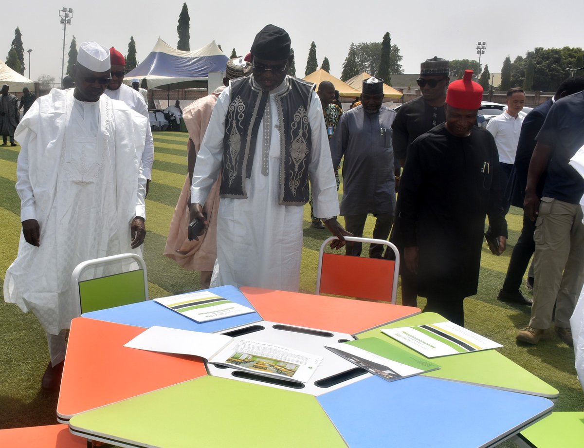 Officials and guests at the exhibition and demonstration of BYD Electric Cars at the Tukur Buratai Research Centre on Friday.