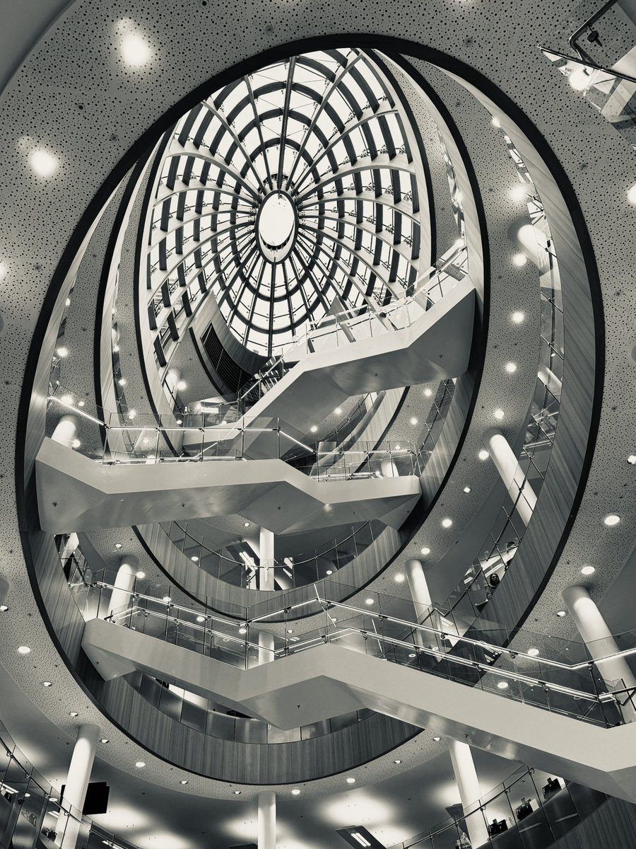 Liverpool Central Library 
1: top looking down
2: bottom looking up

Both equally amazing views!