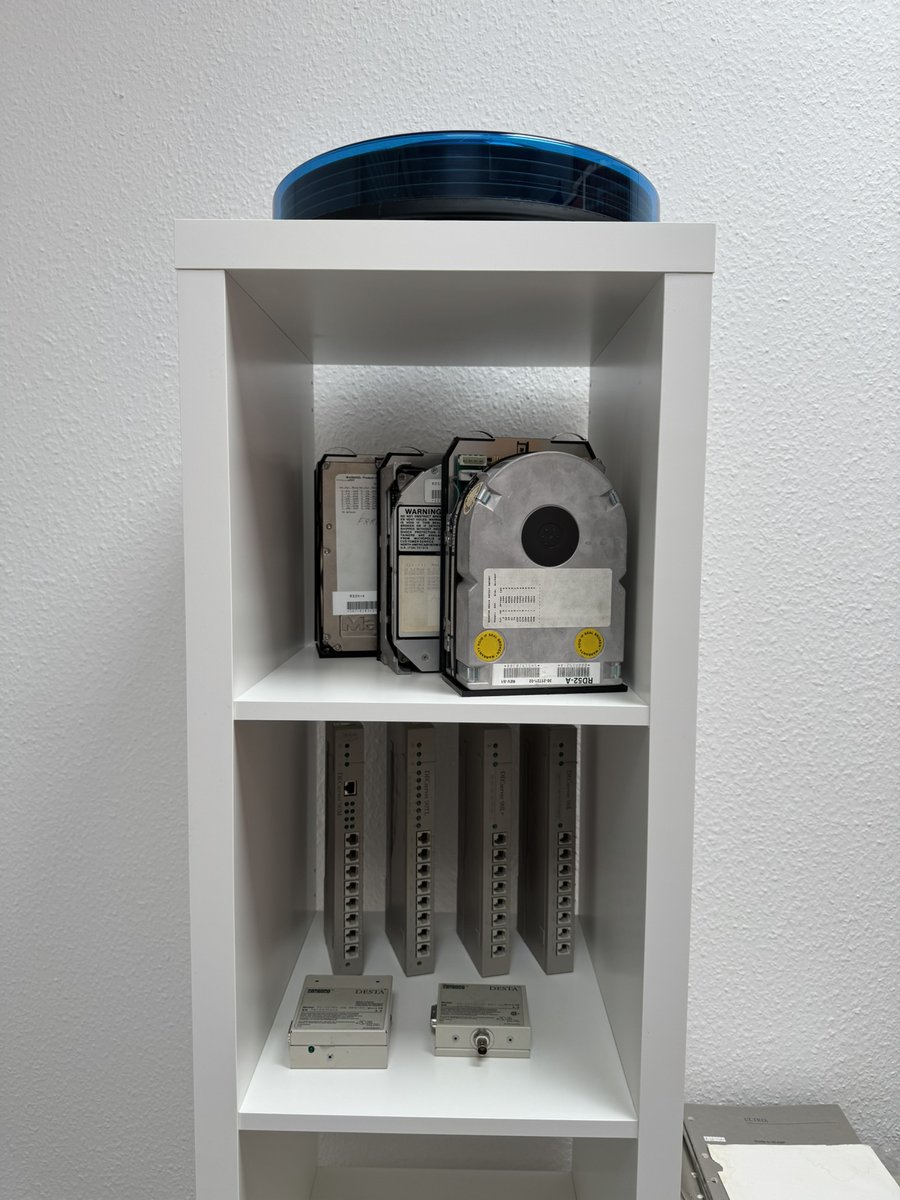 deccomputers's tweet photo. I have now placed a bit of unused hardware in my entrance: four different models of #DECserver 90, two #DESTA as well as a RD52, a RD53 and a RD54 hard drive. https://t.co/8kswfy7F01