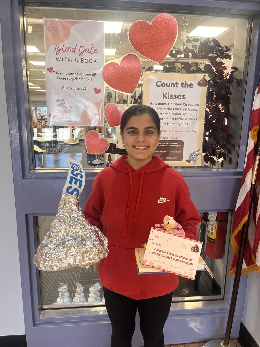 MrsSokhey's tweet photo. Congrats to our Count the Hershey’s Kisses scavenger hunt winners—8th grader Manka and 6th grader Christopher! 

Plus, some of our students are taking a chance on a Blind Date with a Book—who knows what new favorites they’ll discover? 📚💘 #WoodlandReads #LibraryFun” https://t.co/aRjRaZTZ2R