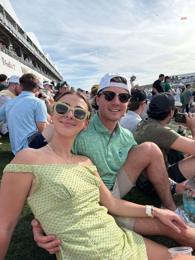 Happy couples watch golf together. We don't make the rules. Happy Valentine's Day!