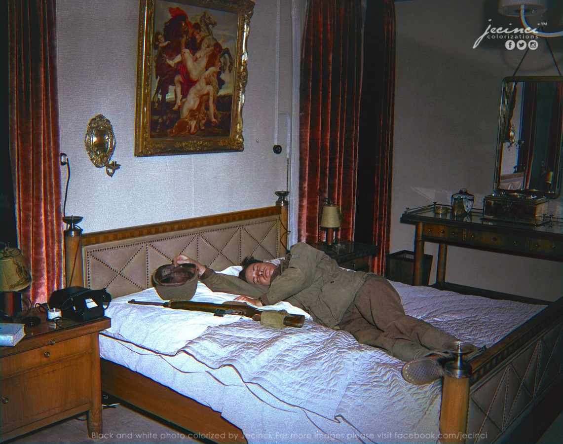 VoicesofWW2's tweet image. &quot;The Rape of the Daughters of Leucippus&quot;

A GI from George S. Patton&apos;s 3rd Army, pretends to sleep in Hermann Goering&apos;s bed, at Veldenstein castle, in Newhaus, Germany - 1945 
#colorized by Jecinci

Hanging above the bed, is &quot;The Rape of the Daughters of Leucippus&quot;(reproduction),…