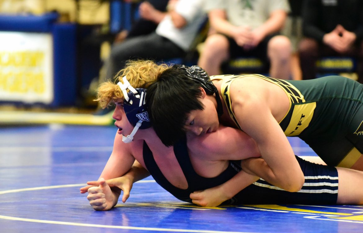 Ryan Tang (150) concludes his tournament with a loss to Calvary Day.  

Junior has another year to shine for the varsity wrestling team!!