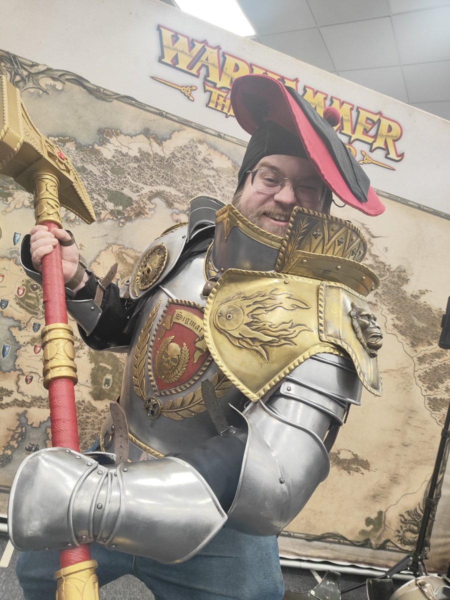 Valquesse's tweet image. Spent the day down Warhammer world for the store anniversary, been a cracking day out, spent far too much money and even got to try on some larp gear! 
Now to decide which one becomes the new profile photo, suggestions are accepted.