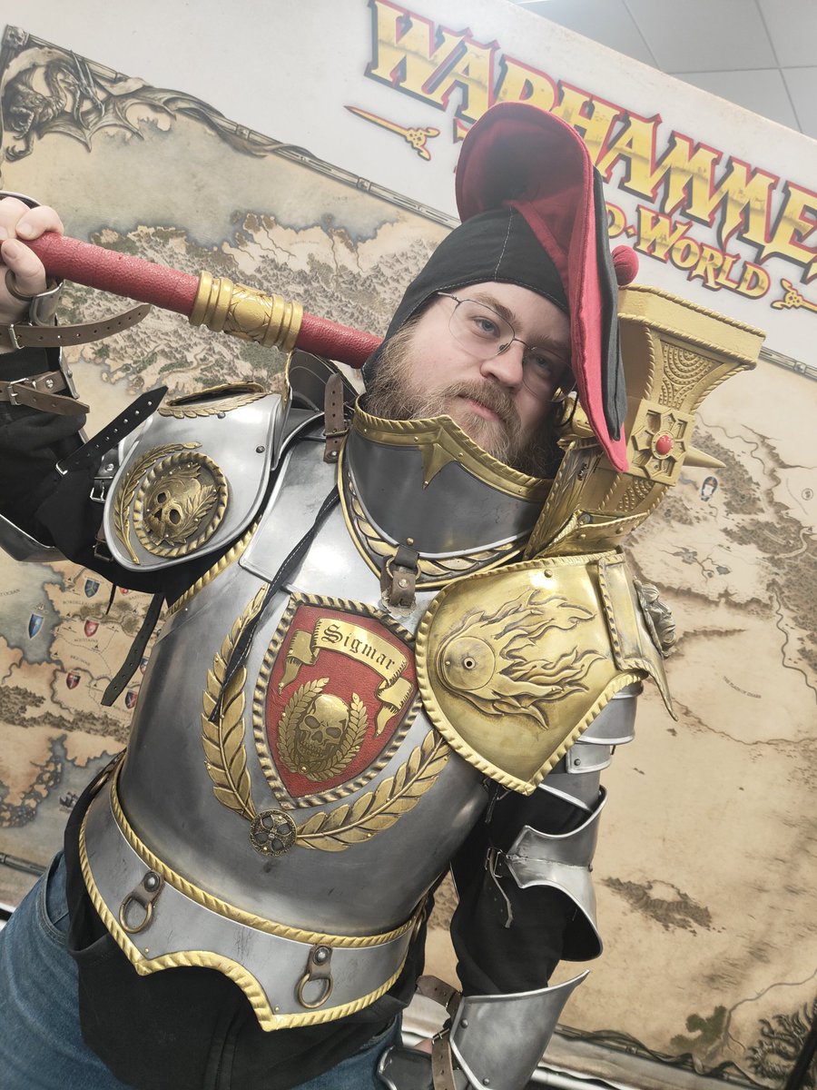 Valquesse's tweet image. Spent the day down Warhammer world for the store anniversary, been a cracking day out, spent far too much money and even got to try on some larp gear! 
Now to decide which one becomes the new profile photo, suggestions are accepted.
