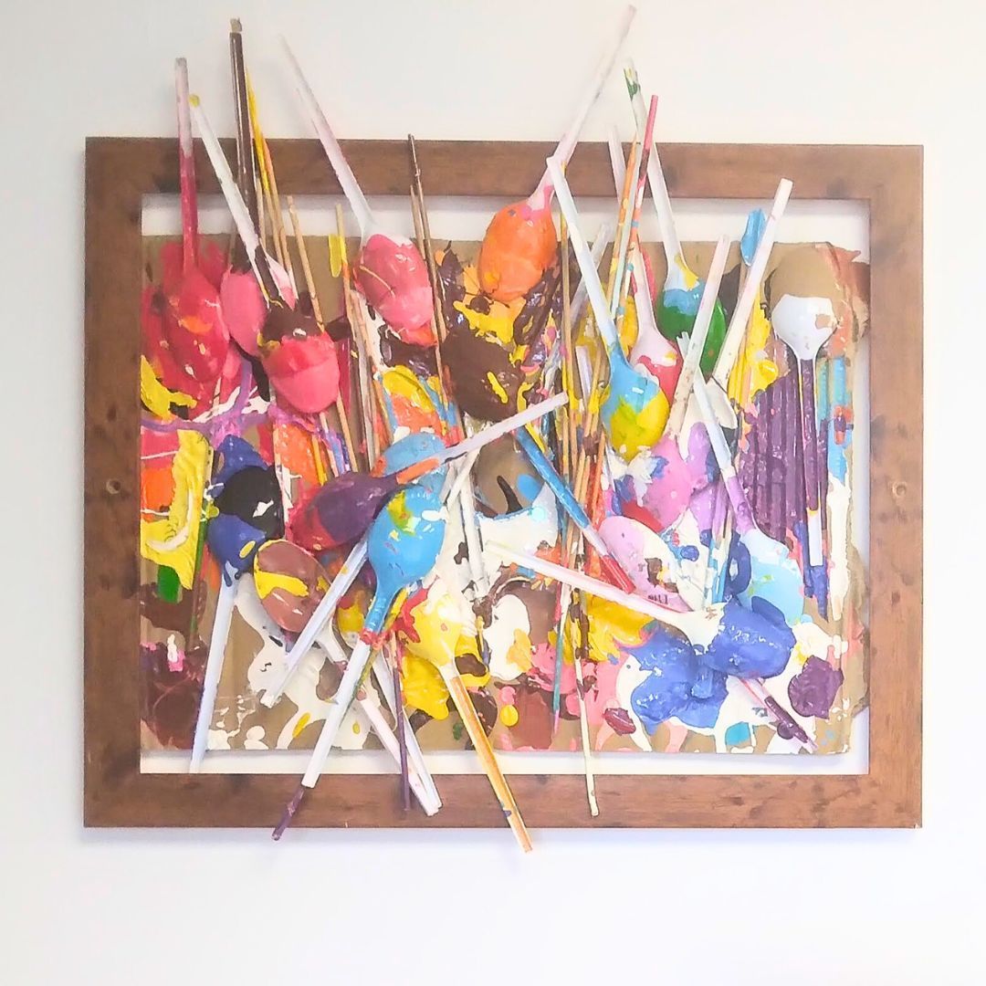A special artwork hangs in the Hackney Playbus office—these are the spoons we used to mix the colours for painting the outside of the Playbus! 😆 A beautiful piece of community art that we treasure, that reminds us of the collective effort that brought the Playbus to life. 🌈💛