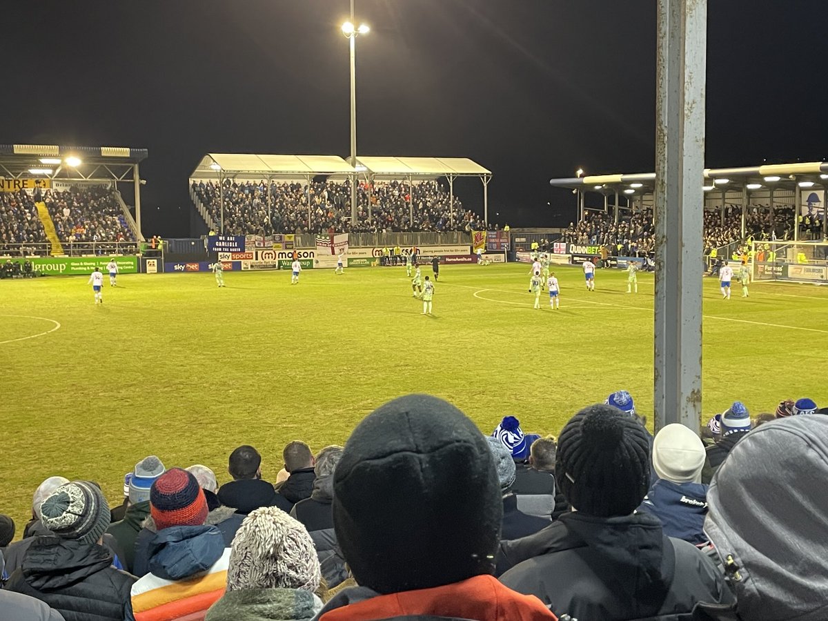 Rock bottom of the league and Carlisle have sold out their allocation and brought more than 1000 fans here on a Thursday night. They lead Barrow 1-0 #cumbrianderby