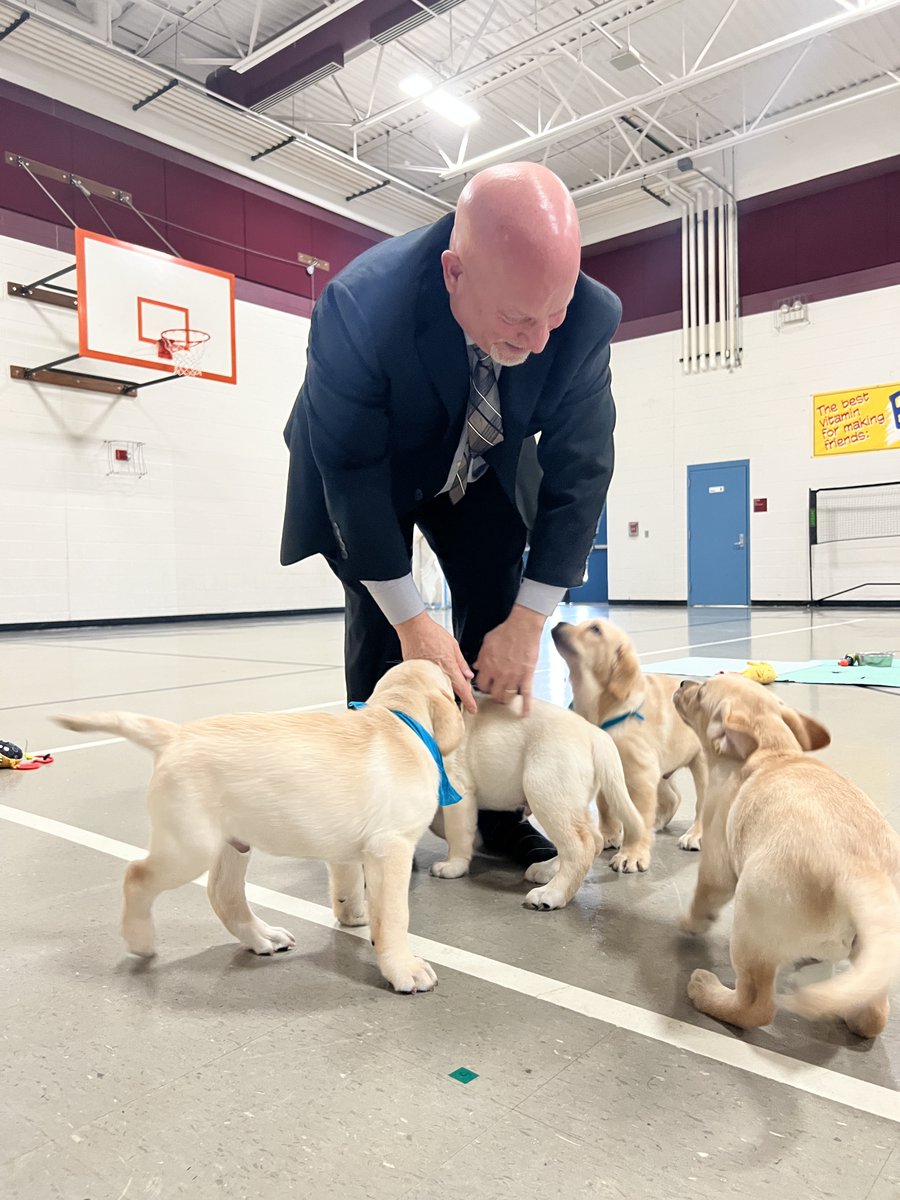 We were all smiles this afternoon as the newest litter of puppies from Campus K9s, Inc. visited Millennium! Louie took home the Top Dog title in December and our prize was a Puppy Party!