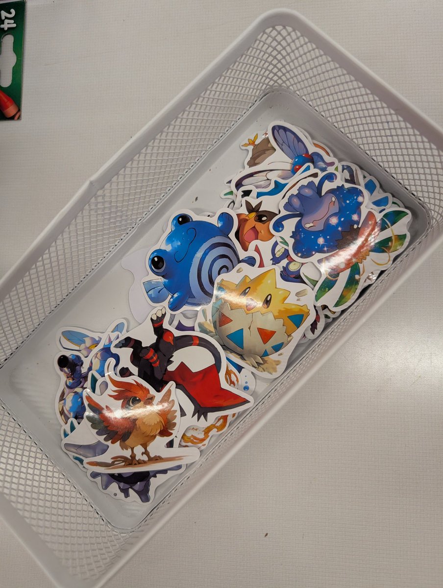 Foxxifye's tweet image. Work made a pokemon day display complete with very fake stickers. Some of them actually look pretty good tho