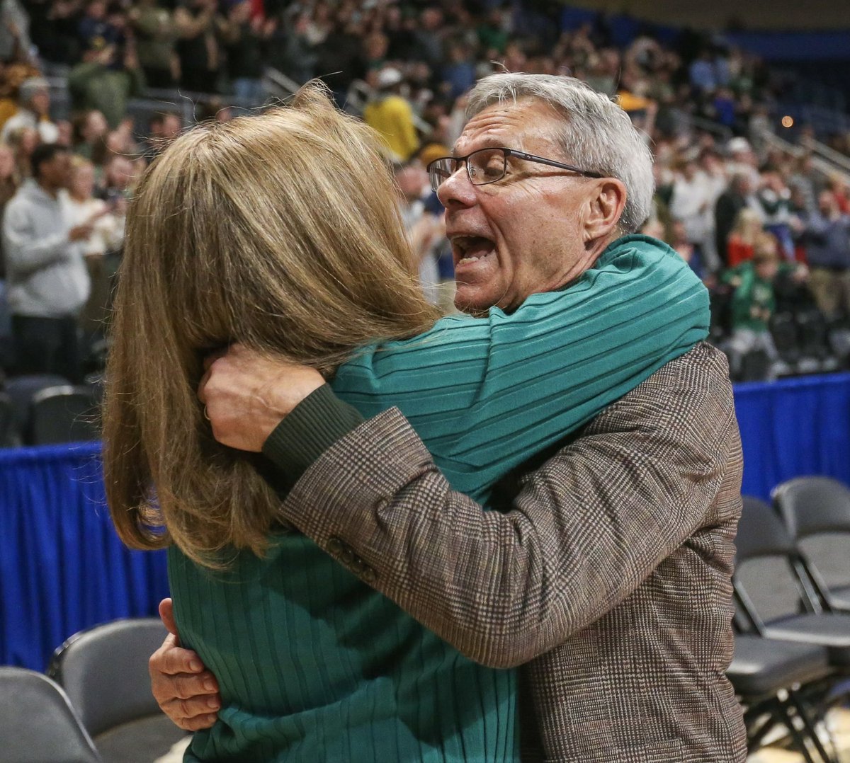 Going out on top. 

Belle Vernon Area head coach Joe Salvino smiles &amp; celebrates with his wife, Toni, after his team defeated North Catholic to win the WPIAL 4A Championship. 

Salvino ranks 2nd on the all-time WPIAL wins list, has won 7 titles, &amp; is retiring after this season.