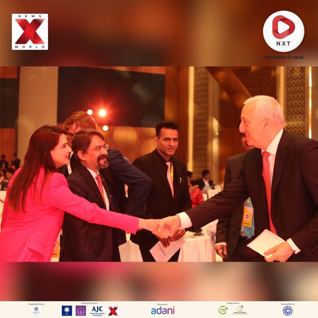 Dr. Mike Massimino, NASA Astronaut, shares a memorable moment as he shakes hands with Megha Sharma, Executive Editor of News X, and Rishabh Gulati, Editor-in-Chief of News X, at NXT Conclave 2025. A powerful exchange of ideas between space exploration and media leadership.