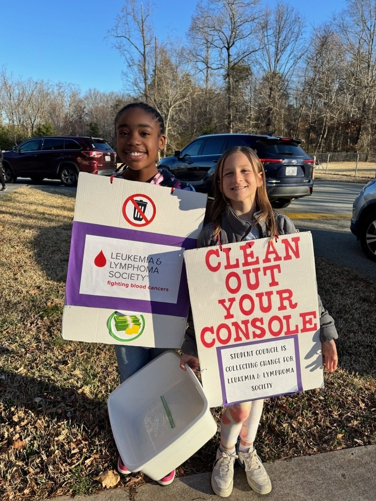 Our student council president and vice president, helping us collect coins for LLS on our final day of the clean out your console campaign. Families have one more week to donate online.  We will announce the class winner next Friday, March 7th.
