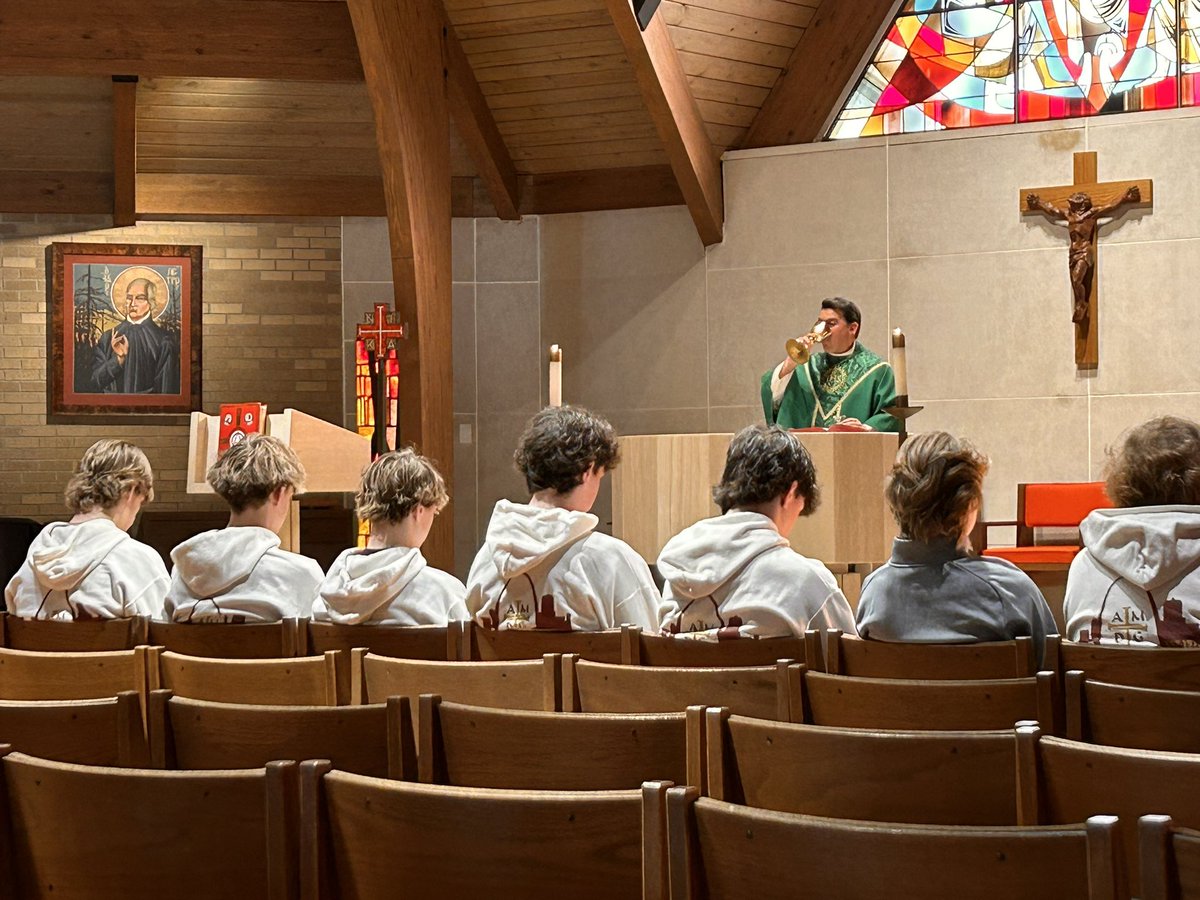 DSJMinistry's tweet photo. This is how the hockey team started their day, in prayer, together at Mass. Not praying for victory, but rather, in gratitude for their gifts and that they use those gifts for the greater glory of God.

#playandpray together at @DeSmetJesuitHS @DESMETHOCKEYSTL https://t.co/LUZ4NRerVk