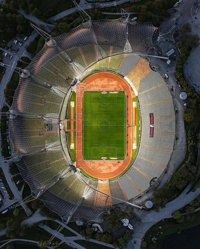 parametricarch's tweet photo. 🧵1/3
The Munich Olympic Stadium, designed by Behnisch and Partners with Frei Otto, was built for the 1972 Summer Olympics to represent West Germany’s democratic renewal. Unlike the rigid, monumental architecture of the 1936 Berlin Olympics, this design embraced transparency and openness, symbolizing a break from the past. Inspired by the rolling Bavarian landscape, the stadium was partially sunken into the ground, creating a less imposing presence.