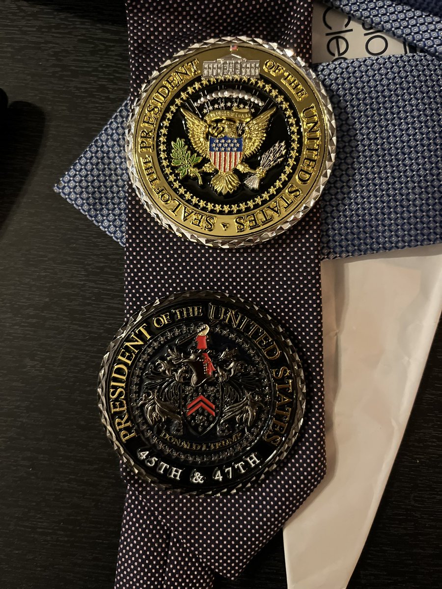 We were unexpectedly rushed into the Oval Office to meet Trump. 

As we arrived, Trump was going on about his gold coins challenge, and how hard it was to find who made them. Finally the maker contacted Trump from California.

Then he showed the dark coin and said they were