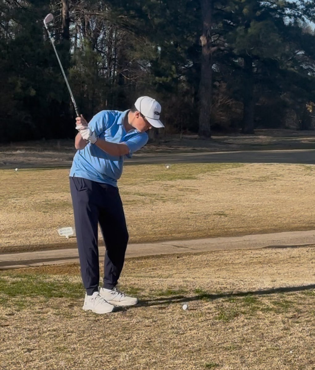 Garrett Trahan tries to reach the green on #8 at Huntington