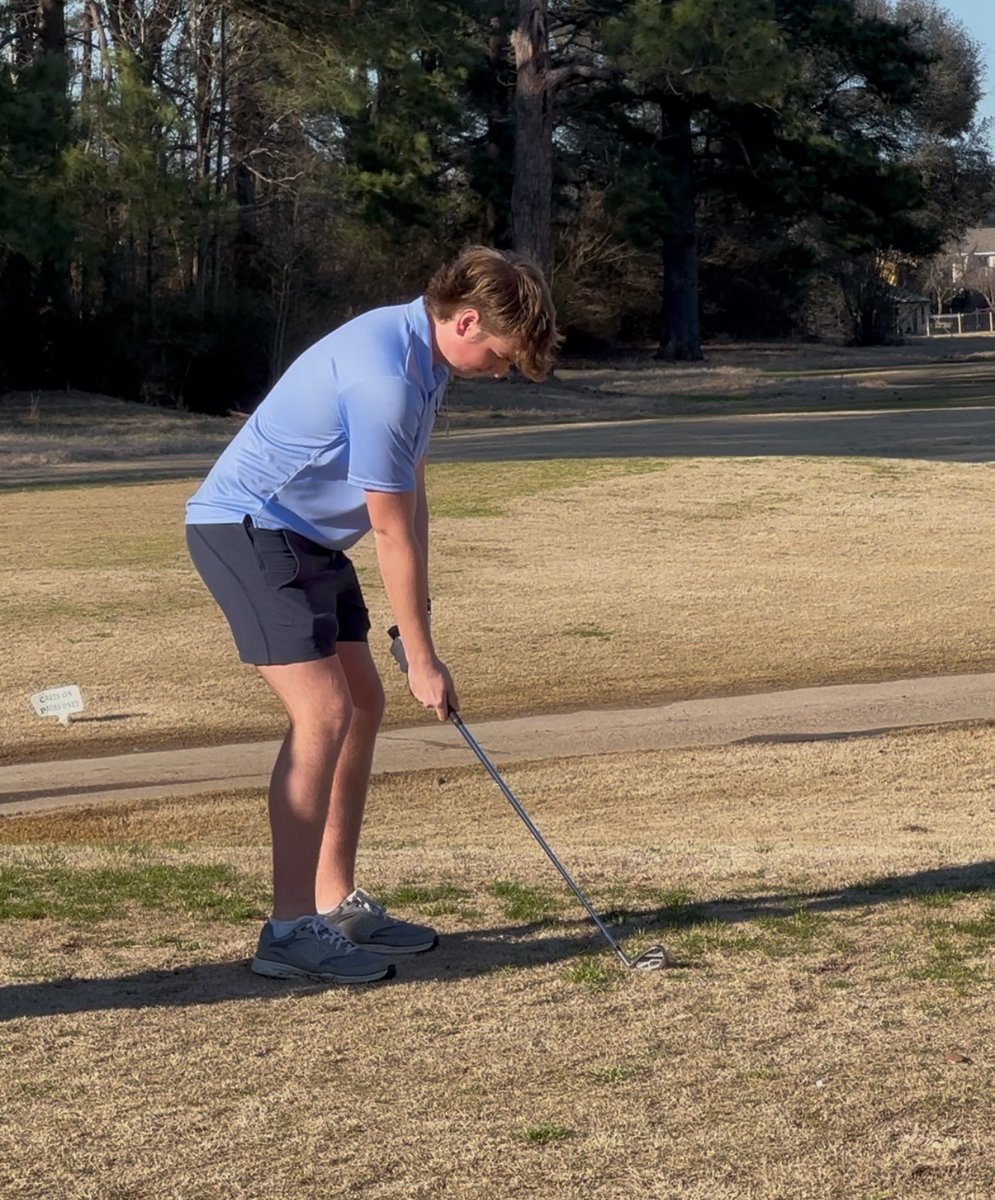Zach Jones approaching the green on #7 for Airline