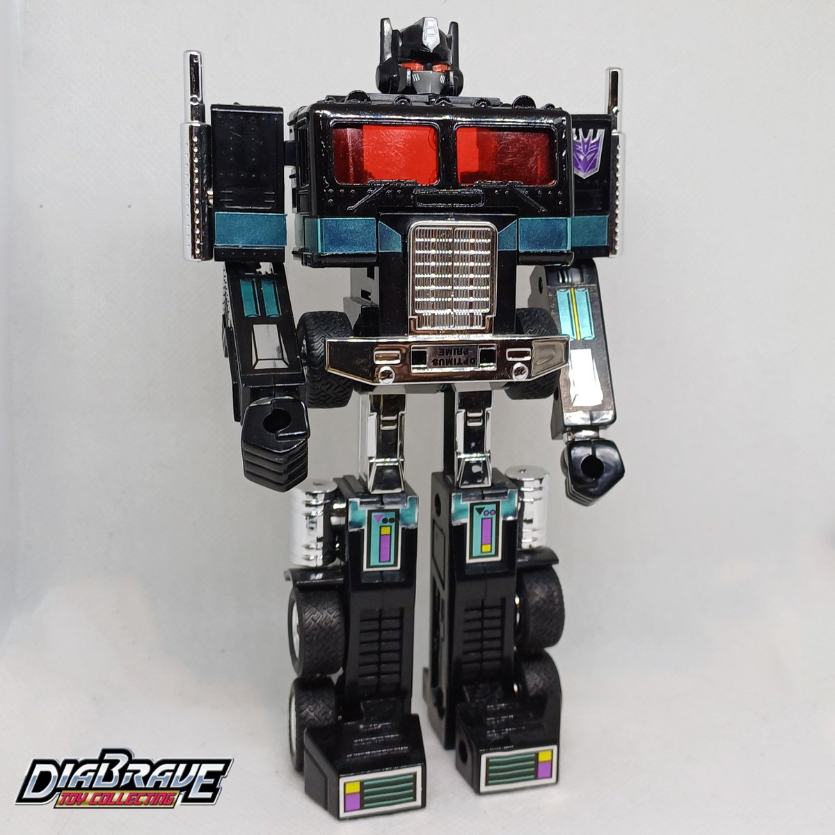 Alright, took another pass at perfecting my G1 Nemesis Prime

Painted eyes red, fixed the faction logo, popped out the window and clipped a tech-spec reader between the window and the metal (so yeah, you can read box tech specs through his glass if you want)

What do we think?