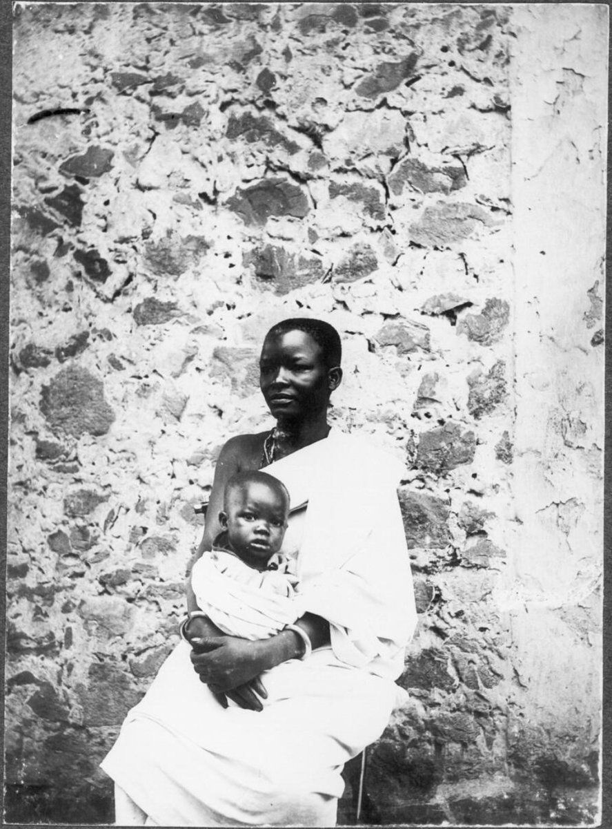 Chagga woman with child in Moshi, Tanzania, ca. 1901-1910.

(From: International Mission Photography Archive—Leipzig Mission.)