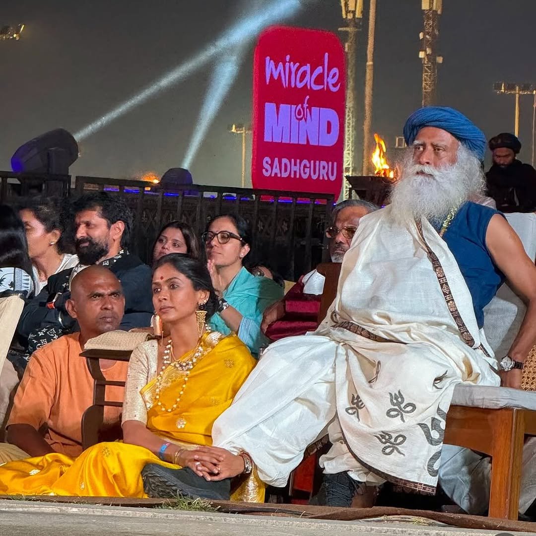 SudhaSimple's tweet photo. Be it the father-daughter dance moment on stage or just a little girl holding onto the feet of her father moment - this years Mahashivrathri was just Guru and Akka stealing all our hearts🥹🥰 https://t.co/HWqN8WJiZq