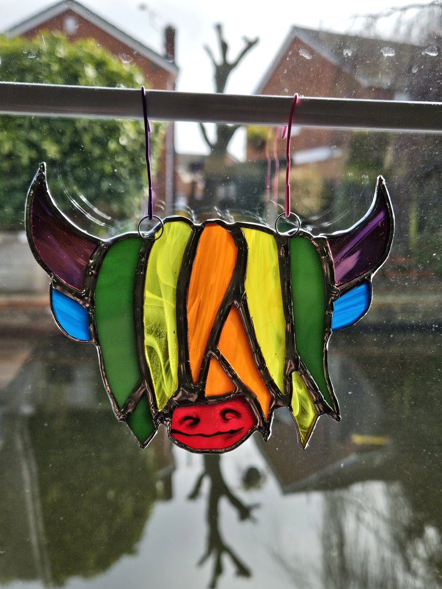 k8glassdesigns's tweet photo. After making the rainbow moribus I had some 'scrap' glass, so decided to turn it into a #Highlandcoo #stainedglass #madeonaboat #Electricboats #Ortomarine @everyone https://t.co/iH0JkK2ASL